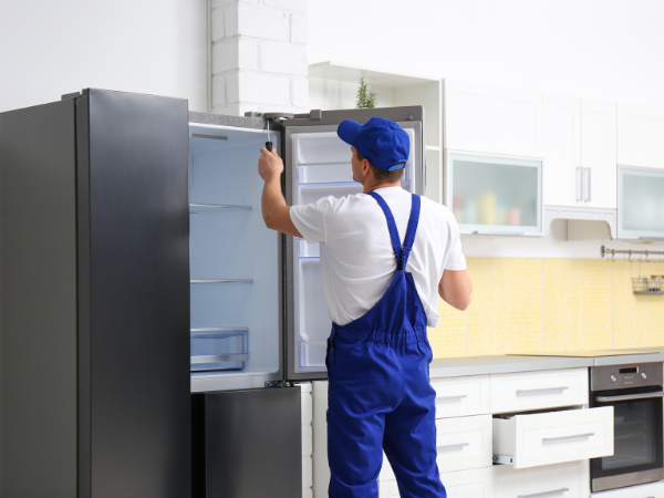 Refrigerator repair technician